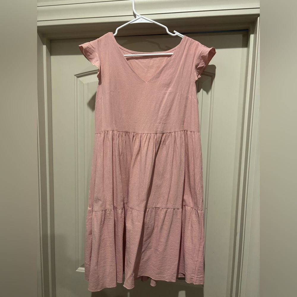 Women’s pink sundress with ruffled sleeves